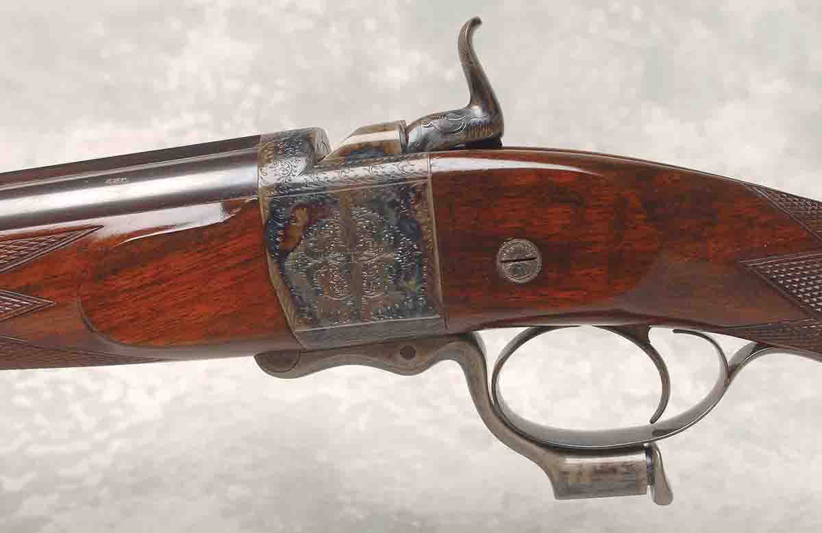The Alexander Henry falling block single shot action. The rifle was refinished and re-casehardened by London-trained McKenzie Highsmith of Memphis many years ago.